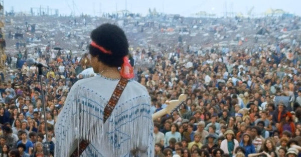 Jimi Hendrix playing for the crowd at Woodstock '69